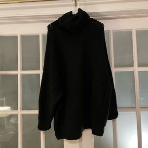 Black turtle neck sweater dress from Zara